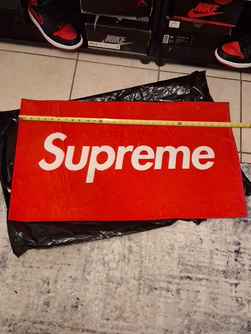 Supreme White Logo on Red Rug